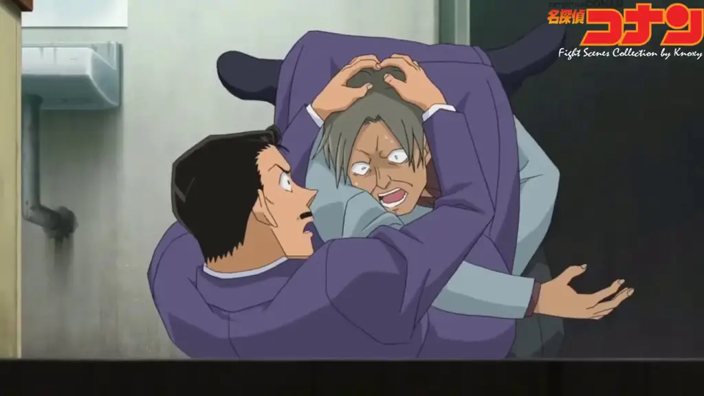 Menikmati keseruan anime Detective Conan Gambar adegan seseorang menonton Detective Conan